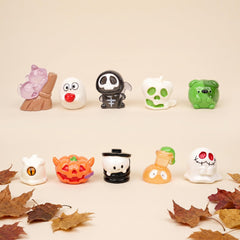 Halloween terrarium decoration with glow-in-the-dark miniature figures
