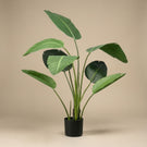 Combineer kunst- en echte planten